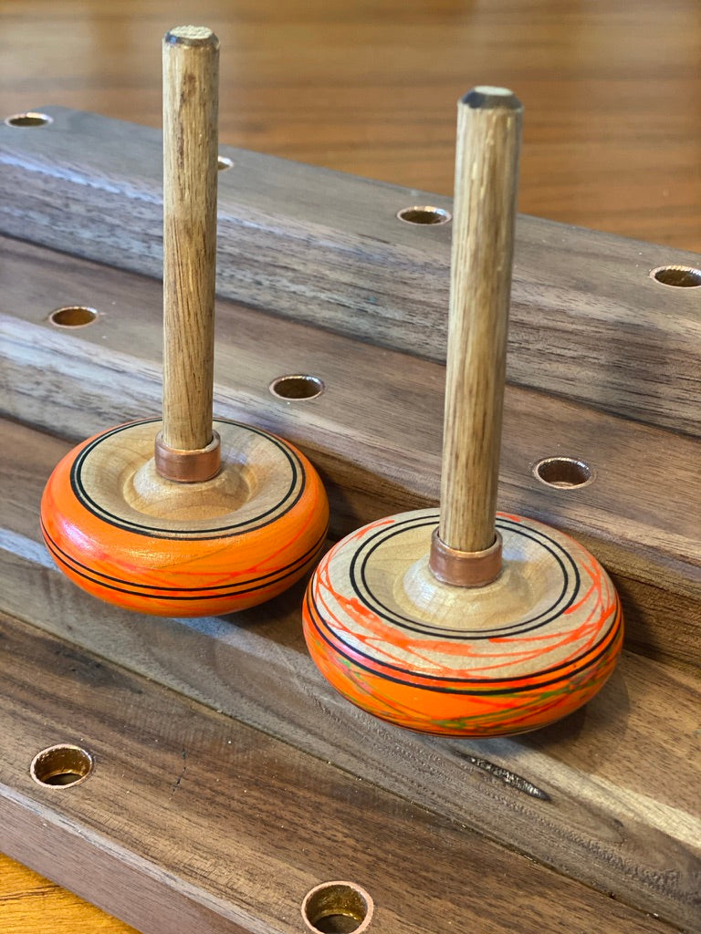 Spinning tops and stand