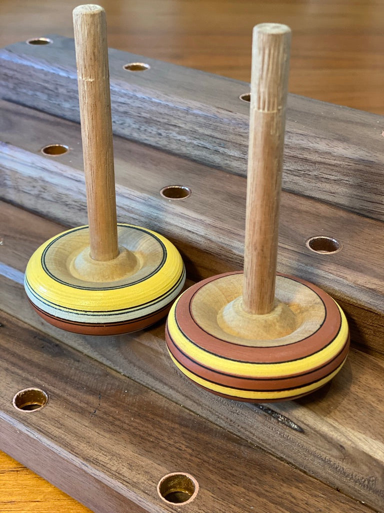 Spinning tops and stand