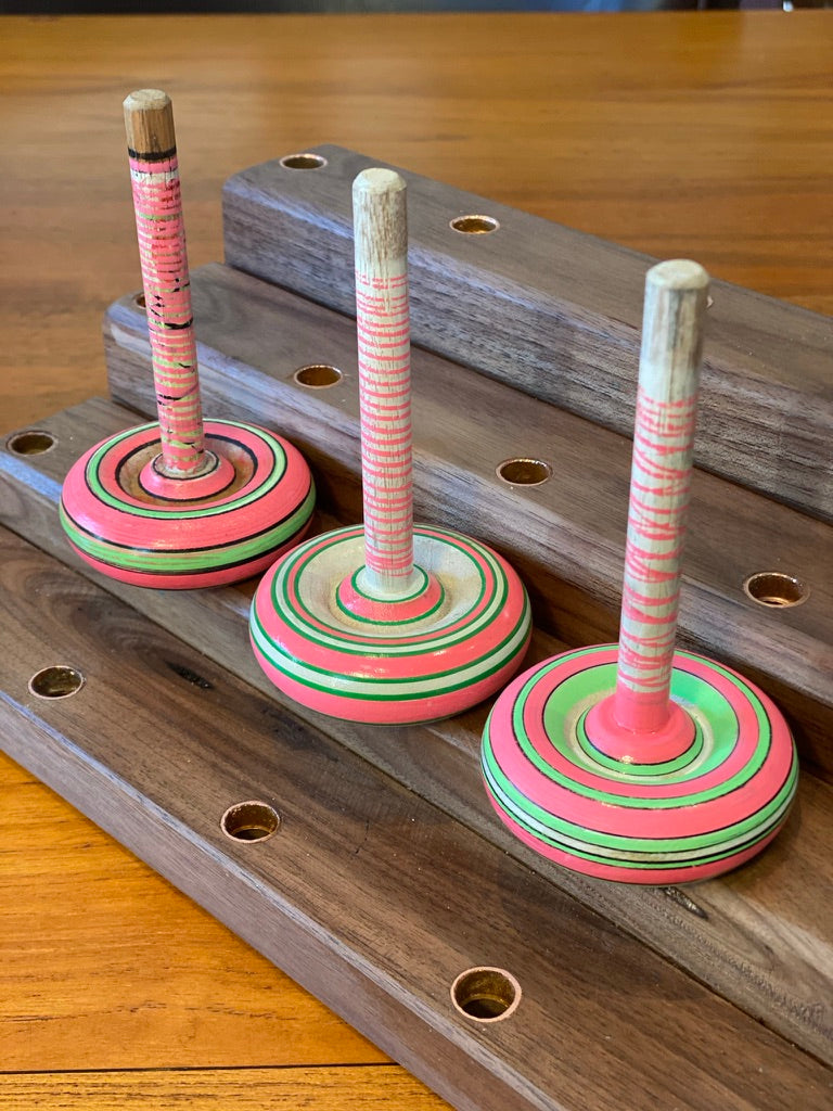 Spinning tops and stand