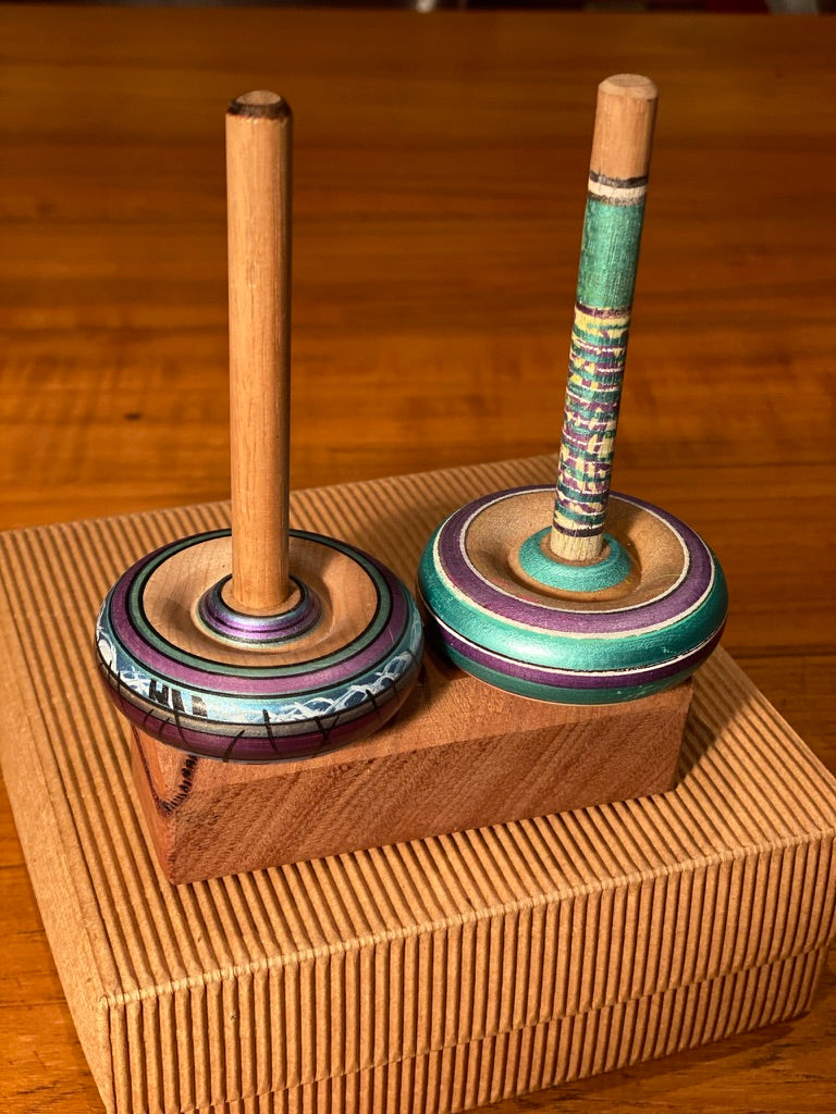 Spinning tops and stand