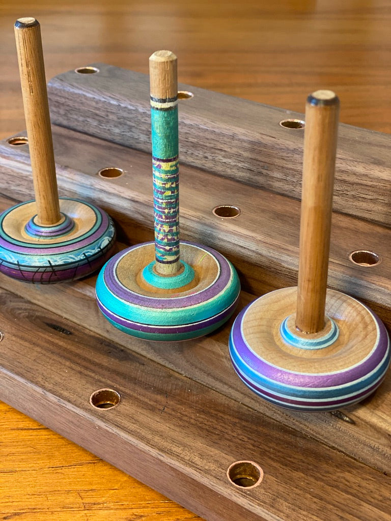 Spinning tops and stand