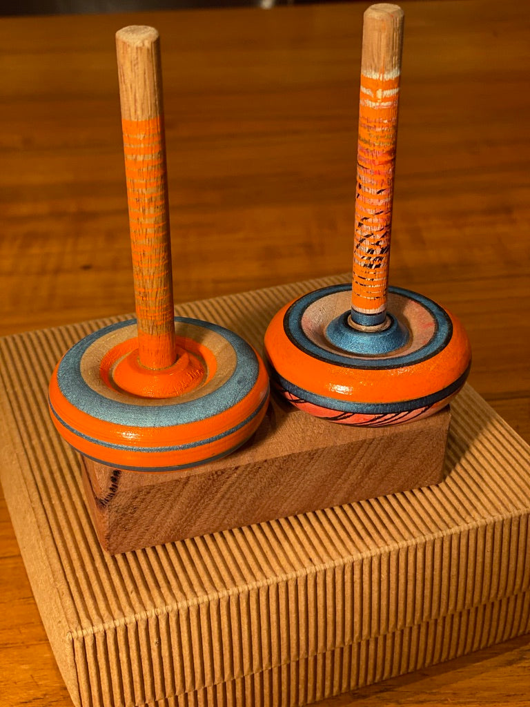 Spinning tops and stand