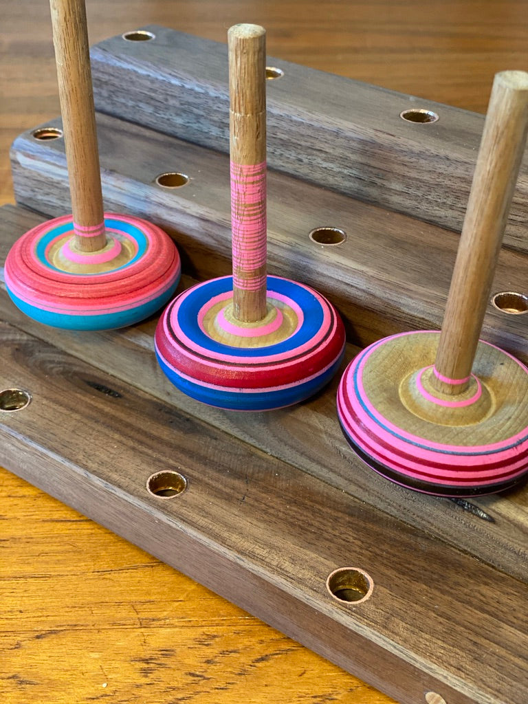 Spinning tops and stand