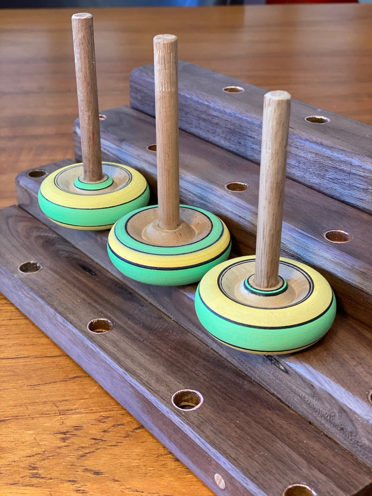 Spinning tops and stand