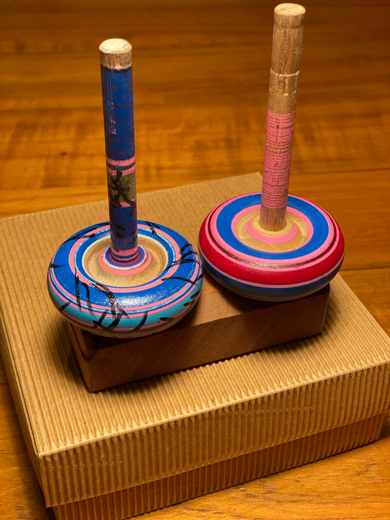 Spinning tops and stand