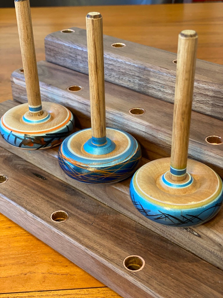 Spinning tops and stand